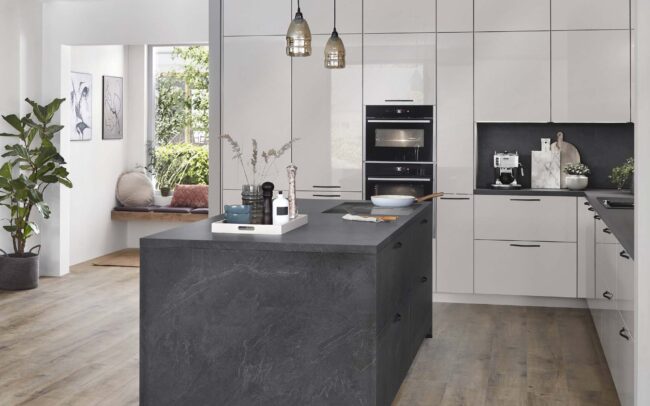 Novalux kitchen with satin grey high gloss finish, sleek cabinetry, and a central island in grey slate. Modern German kitchen design at trade prices